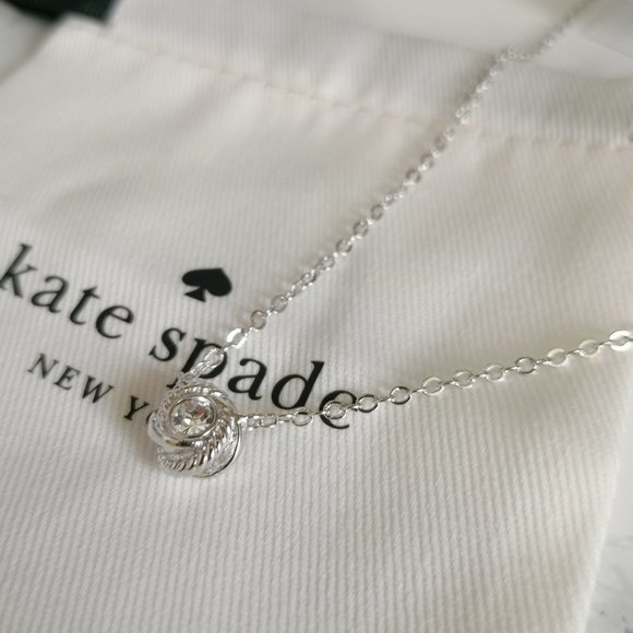 NWT KATE SPADE INFINITY BEYOND KNOT MINI PENDANT SILVER W DUST BAG - Picture 3 of 3